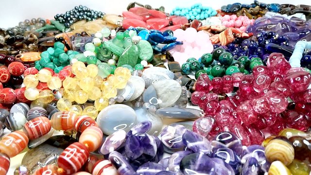 semigem necklaces and beads jewelery as fashion background