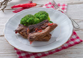 grilled ones rib with broccoli