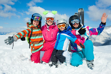 Skiing  winter fun. Happy family