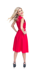 Attractive woman standing back to camera looking over shoulder