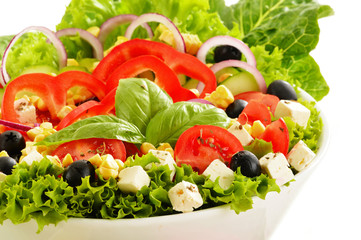 Vegetable salad bowl isolated on white