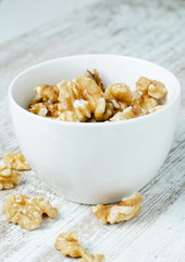 Walnuts in white porcelain cup