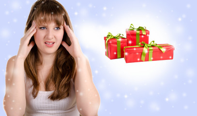 Teen girl thinking the christmas gifts