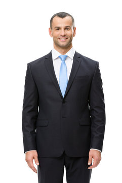 Half-length portrait of smiling businessman, isolated
