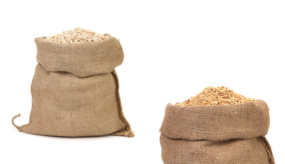Two fool sacks oatmeal grain and flakes.