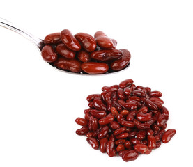 Bunch of preserve beans and on spoon.