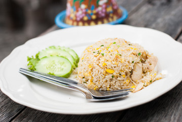 Fried rice with chicken in white dish