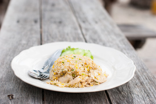 Fried rice with chicken in white dish