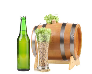 Barrel mug with hop and bottle of beer.