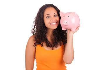 Young african american woman with piggy bank