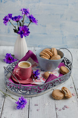 French macaroon on the white wood background