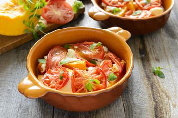 Roasted pumpkin with tomato and oregano