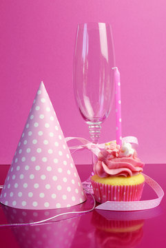 Pink Brithday Cupcake With Party Hat And Champagne Glass