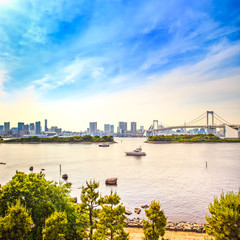 Tokyo sunset Skyline, Rainbow Bridge and bay from Odaiba. Japan