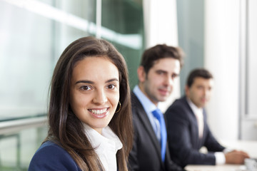 Business team smiling at the office, lined up