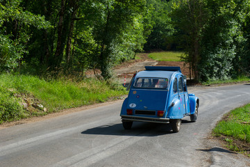 Fototapeta na wymiar Blue French car