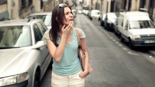Beautiful lost, confused woman in the city