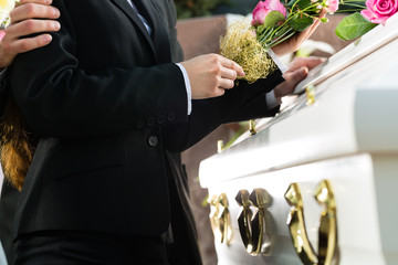 Mourning People at Funeral with coffin