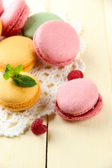 Gentle macaroons on table close-up