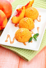 Delicious ice cream on plate on table close-up