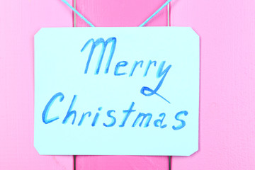 Signboard with words Merry Christmas