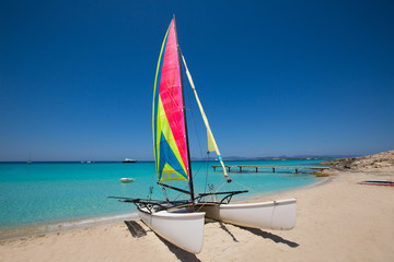 Catamaran sailboat in Illetes beach of Formentera