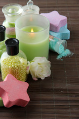 Composition with Aromatic salts in glass bottles and candle,