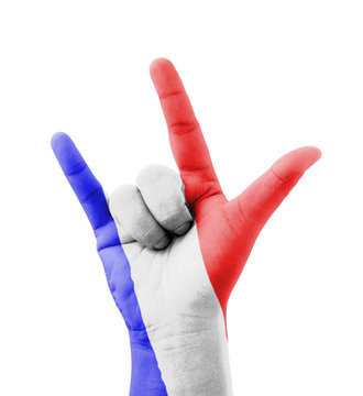 Hand making I love you sign, France flag painted