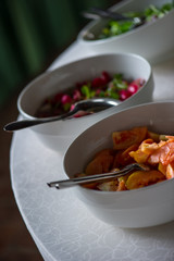 vegetables white cups in evening lights