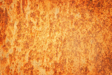 Rusty textured metal background. Cracked rusty metal wall.