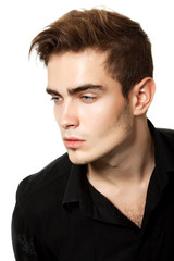 Fototapeta premium Handsome trendy young man in black shirt, portrait of sexy fashi