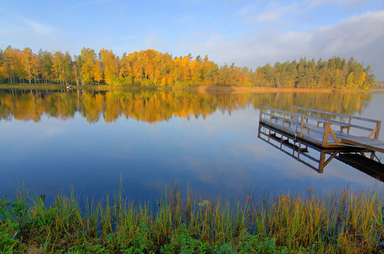 Idyllic morning lake landscape in autumn season