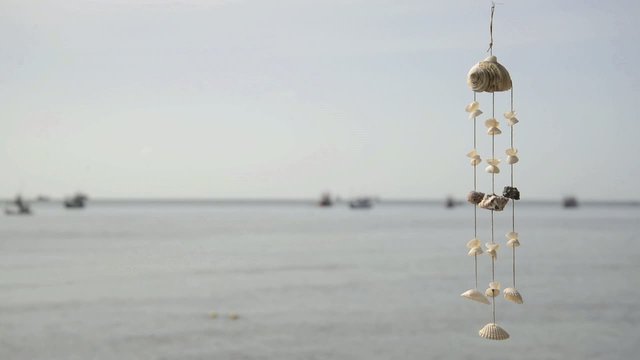 sea shell wind chime by the sea