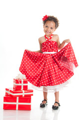 Little beautiful girl with gifts.