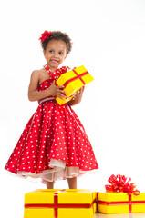 Little beautiful girl with gifts.