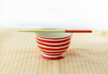 Red dish and chopsticks with oriental style