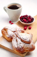 Buns with cup of coffee