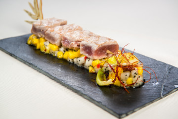 Salmon with mango and pitaya