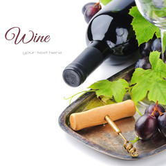 Bottle of red wine and and fresh grape