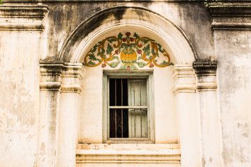 Fototapeta na wymiar Shan style temple old windows in Wat Papoa , Chiangmai Thailand