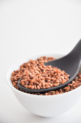 buckwheat in a bowl with spoon