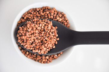 buckwheat in a bowl with spoon