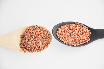 buckwheat in a bowl with spoon