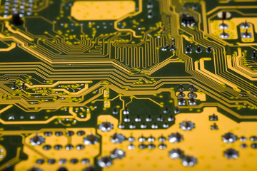 Technology background - yellow printed circuit board