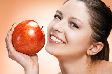 Appealing woman with apple