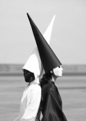 Portrait of two person in black and white clothes. Artwork