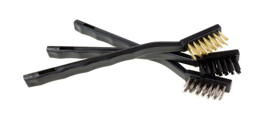 Small industrial brushes on a white background