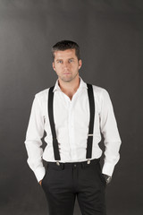 Obraz premium men in white shirts and suspenders
