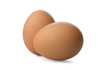 Two Chicken Brown eggs on white background