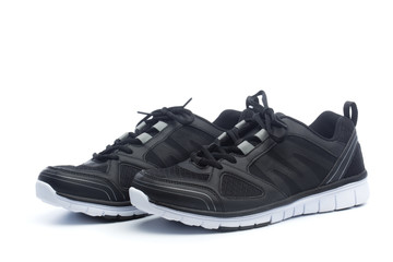 Pair of black sport shoes, sneakers